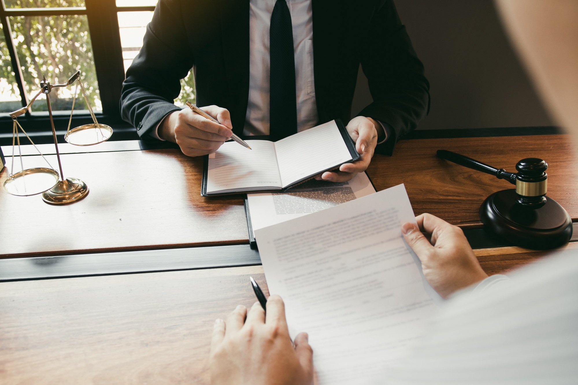 business lawyer is currently counseling the client s trial at the lawyer office